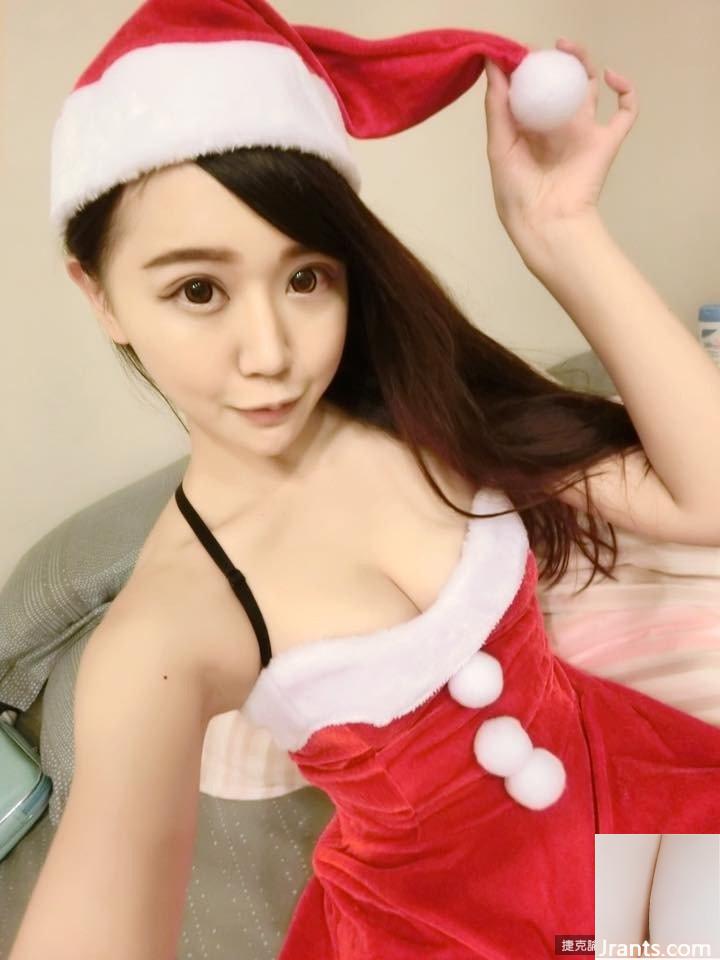 A linda garota Zhang Qiaoyun tem seios grandes e toca os seios em uma roupa de Natal: quero tocá-los (21P)